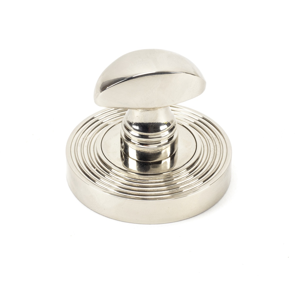 Polished Nickel Round Thumbturn Set (Beehive) in-situ